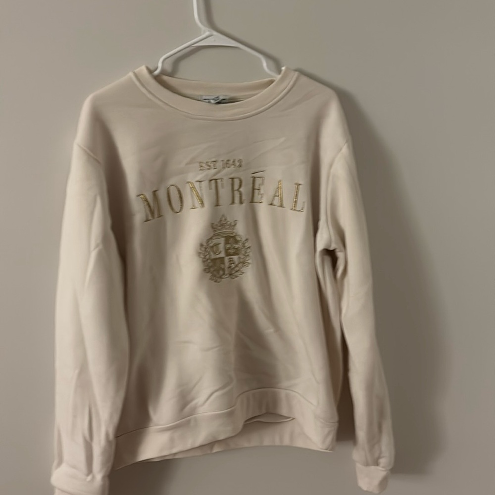 Cream crew neck sweatshirt
